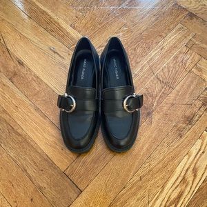 Heeled loafers with gold buckle